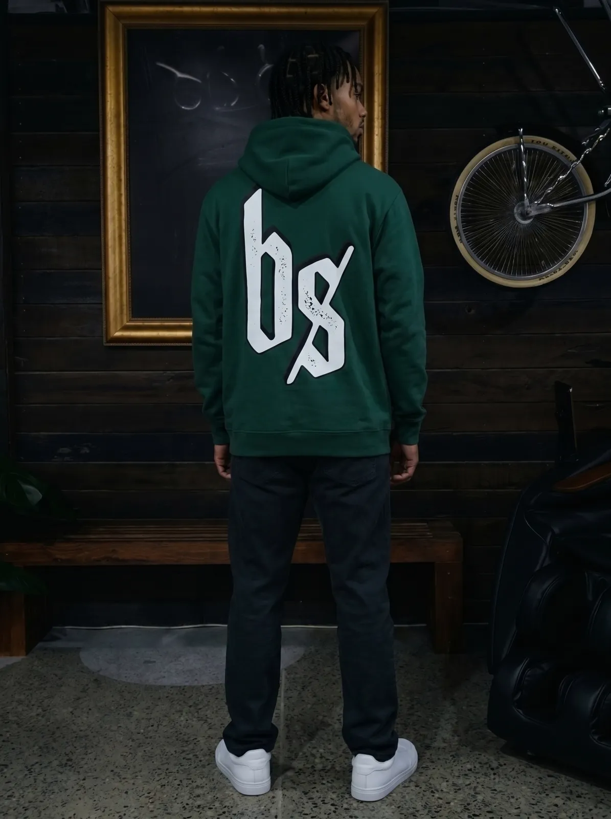 Blacksmith Heavy Hoodie — Pine Green, worn back with bs print